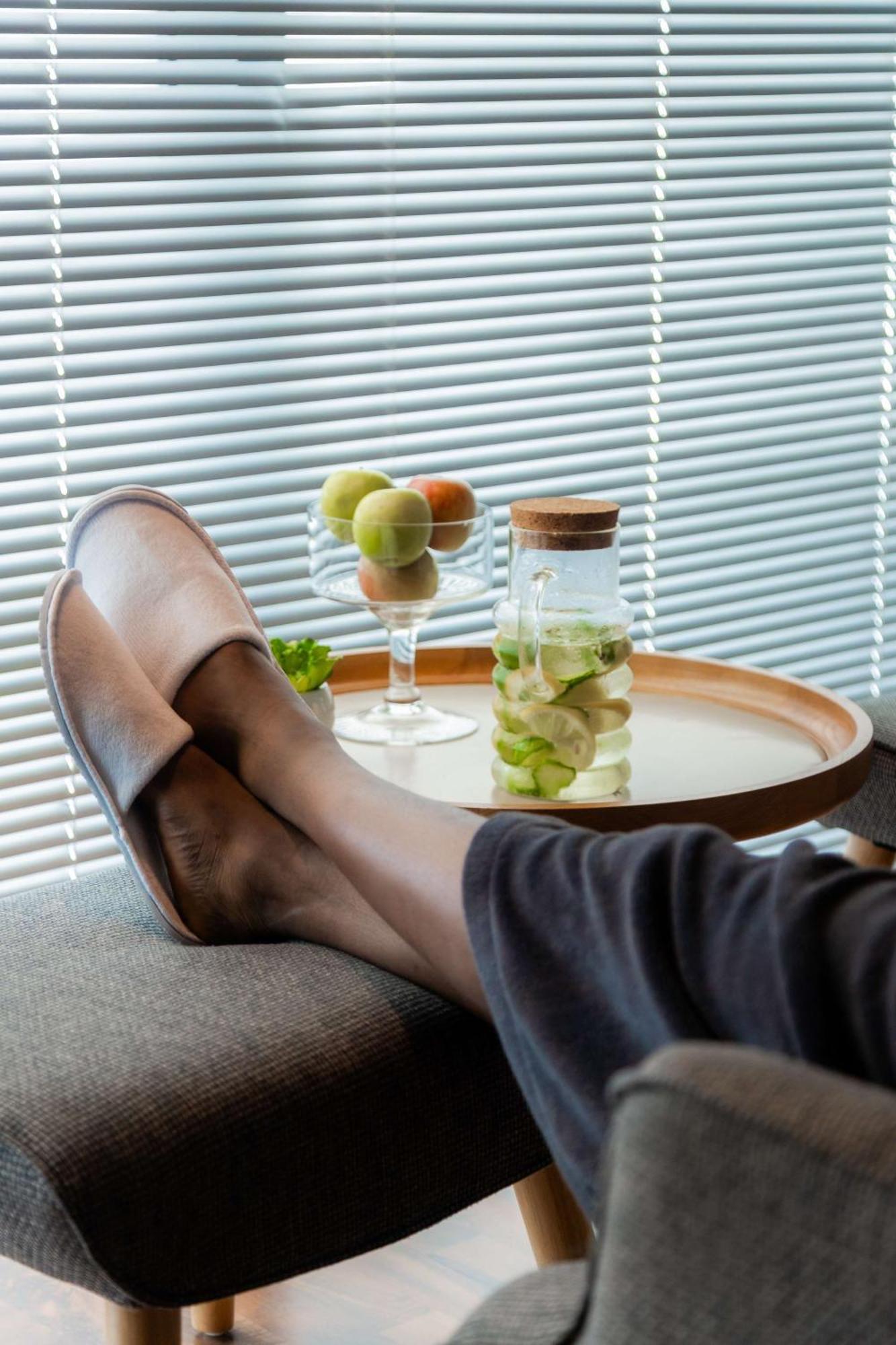 Radisson Blu Hotel, Port Elizabeth Exterior photo A woman relaxing with her feet up